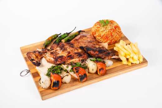  نصف فروج مشوي عالفحم